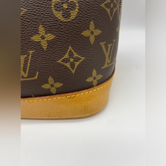 Louis Vuitton Alma Monogram HandBag - Picture 5 of 16